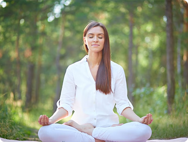 Practising yoga on the sea shore is a good method
